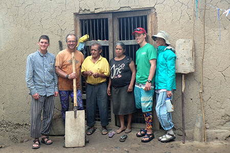 Our family with the farmer and his wife who sold us the paddle