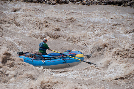 Oar boat in the maelstrom