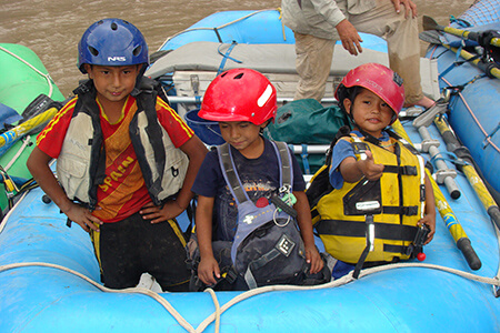 Kids posing in river gear