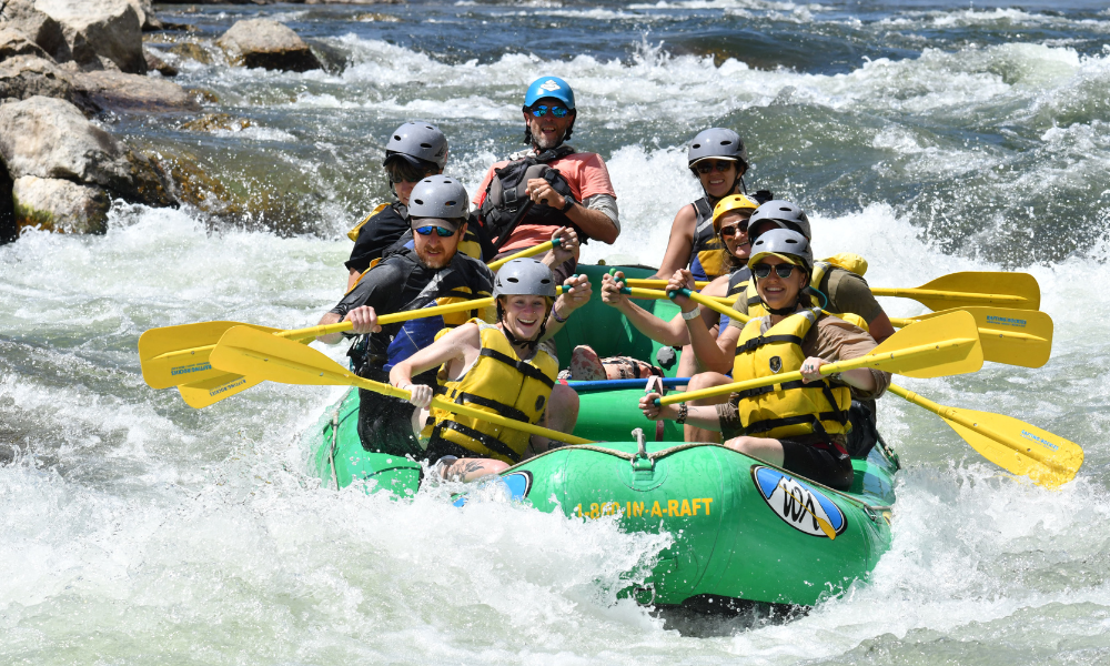 a green raft floats near Buena Vista