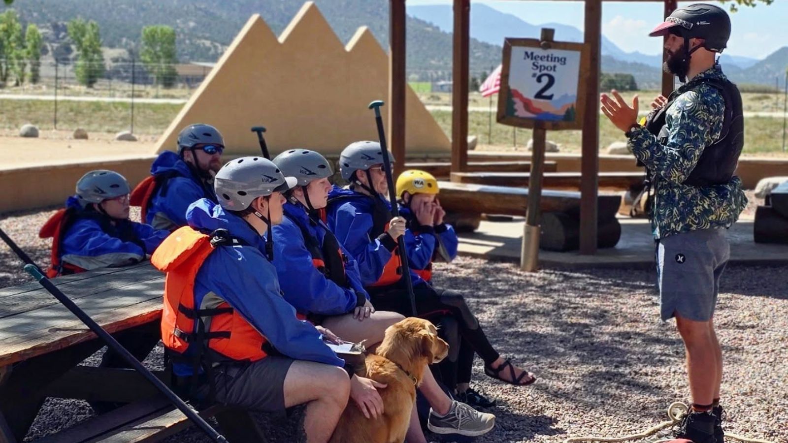 A guide gives a whitewater safety talk